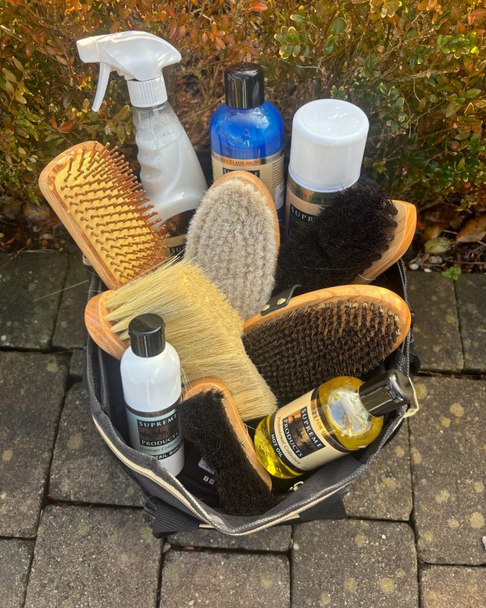 Bag of Supreme Products horse grooming supplies and brushes